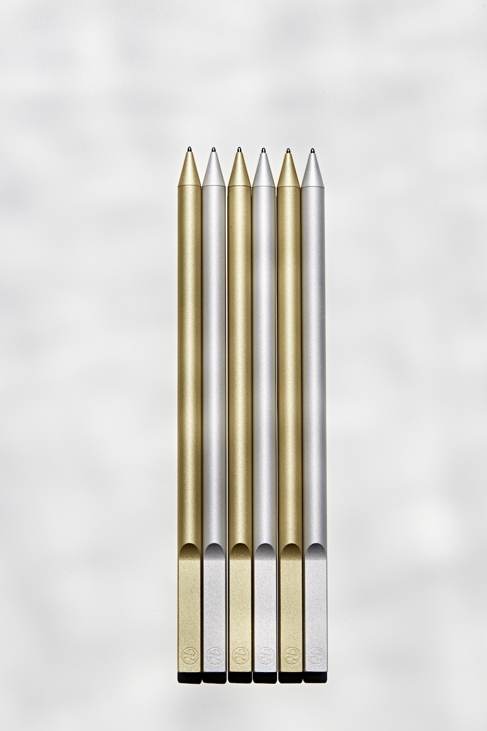 Sechs Pencils · Gold und Silber